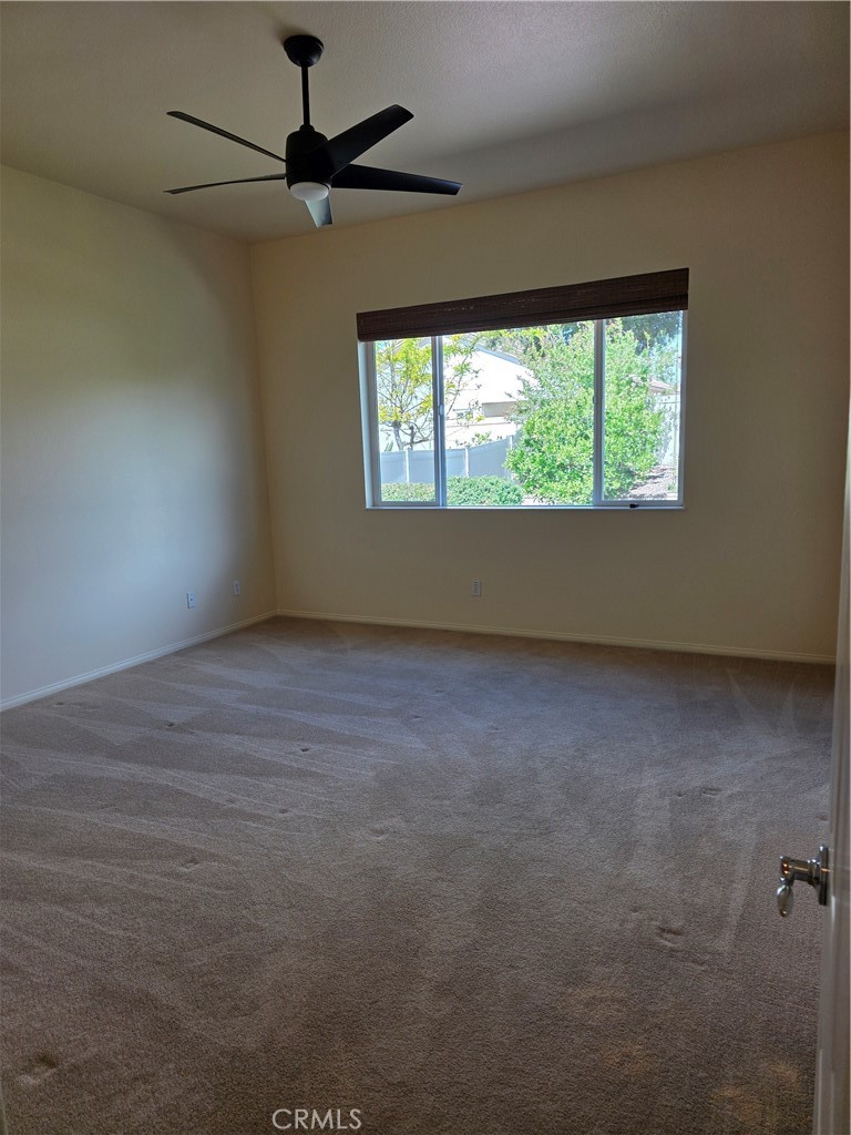 924 Brentwood Road Beaumont, CA 92223 - Photo 22 of 41 an empty room with a window