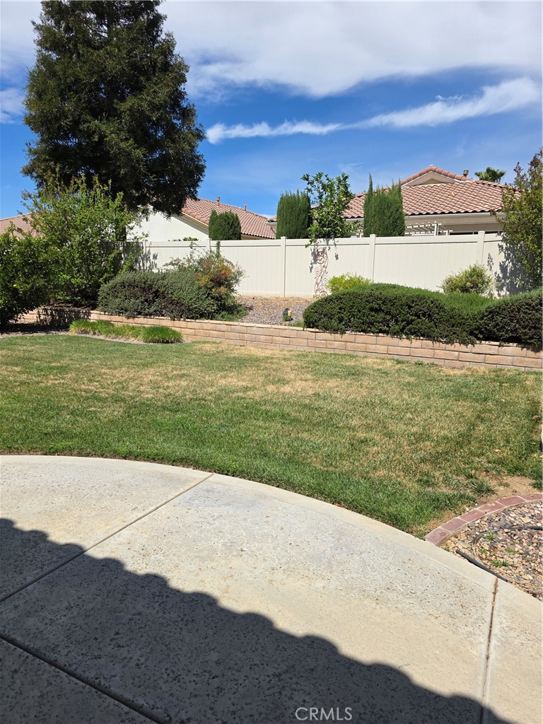 924 Brentwood Road Beaumont, CA 92223 - Photo 40 of 41 a view of a yard with an outdoor space