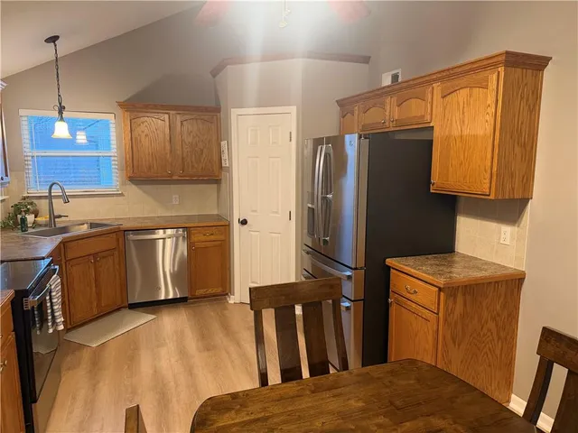 $345,000 | 521 Hillbrook Drive, Lansing, KS 66043