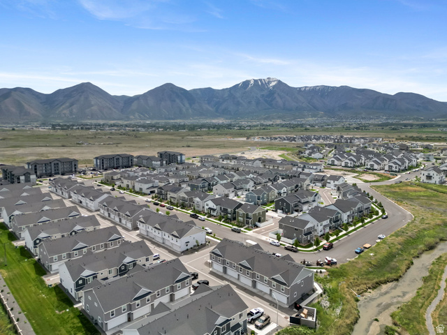 1223 East 1775 North Payson, UT 84651 - Photo 20 of 45 Aerial perspective of a contemporary residential development featuring multiple housing units with gray roofs and varied siding