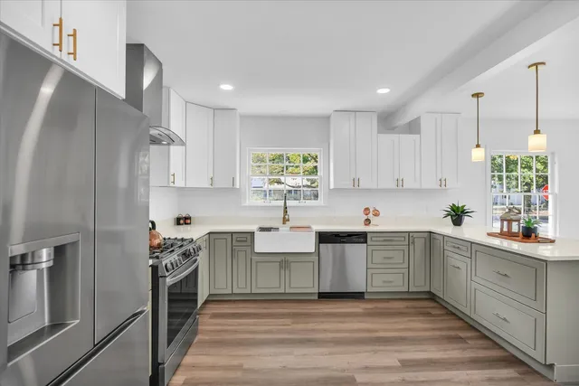 a view of wooden floor and windows in a room