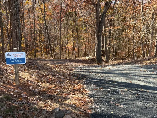 a view of a barn with yard