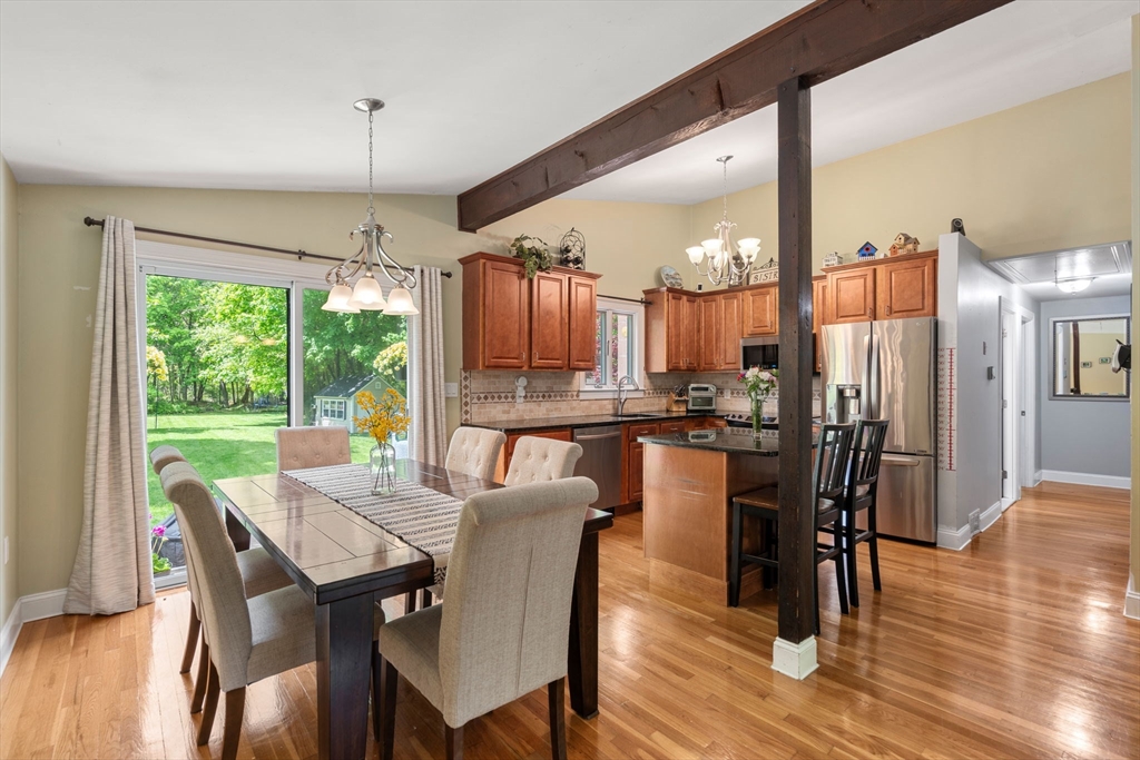25 Fox Lane Concord, MA 01742 - Photo 5 of 24 a view of a dining room with furniture window and wooden floor