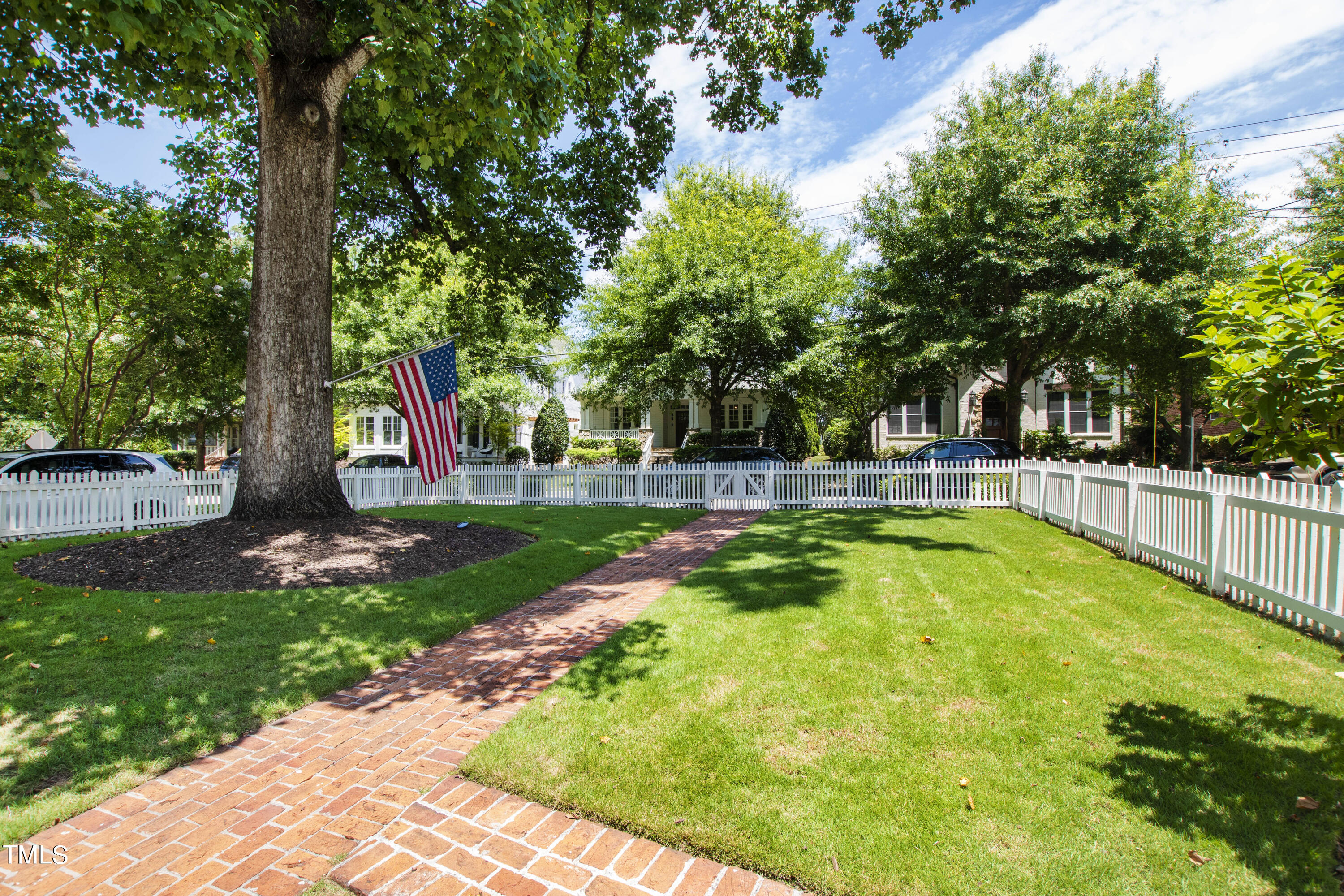 2117 Pine Drive Raleigh, NC 27608 - Photo 3 of 3 a swimming pool with lots of trees and plants