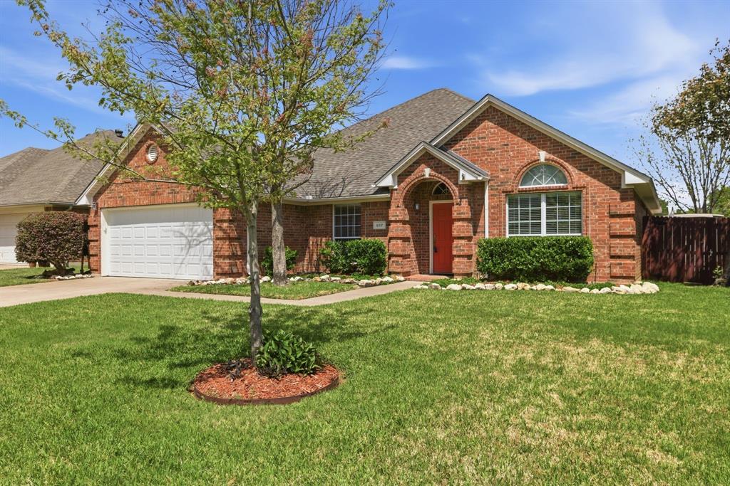 817 Huebner Way Burleson, TX 76028 - Photo 2 of 35 Pretty landscaping and a sprinkler system keep this yard almost maintenance free.