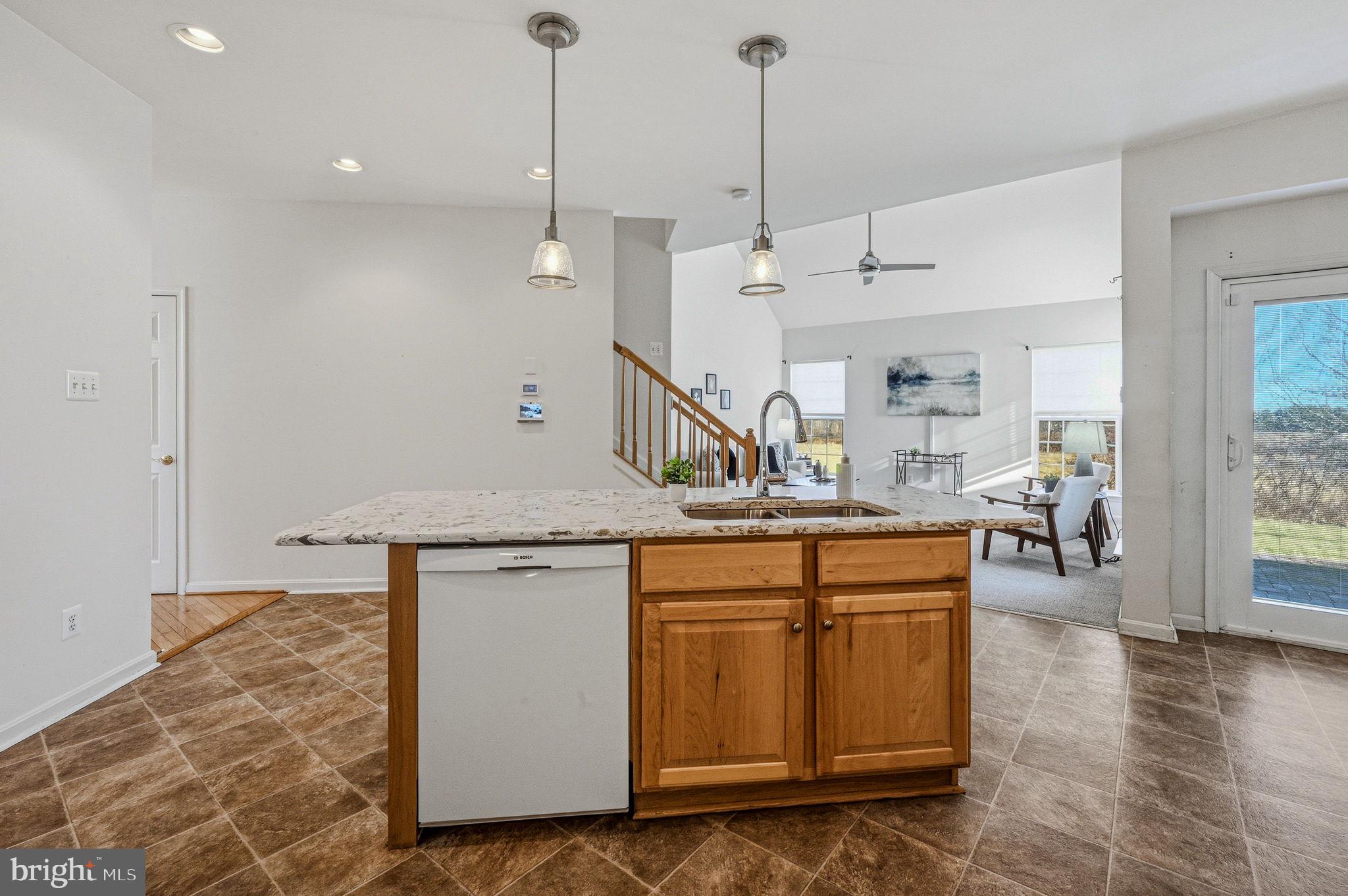 325 Pierce Run Newark, DE 19702 - Photo 12 of 42 a kitchen with white cabinets and sink