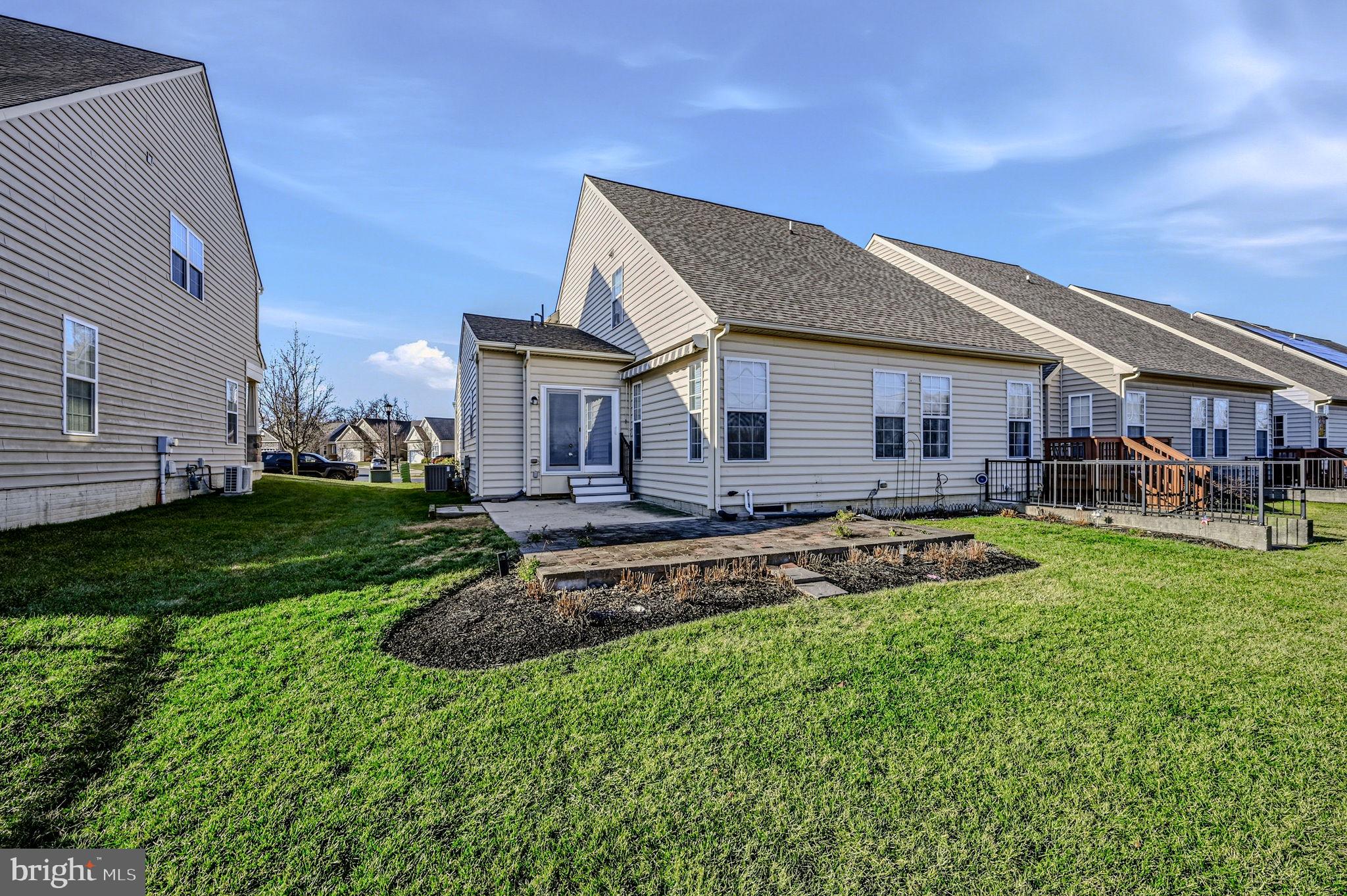 325 Pierce Run Newark, DE 19702 - Photo 34 of 42 a view of a house with a yard patio and swimming pool