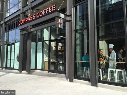 a view of a street with sitting area