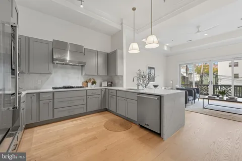 a bathroom with a sink vanity and a mirror