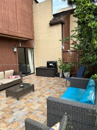a house view with a outdoor space