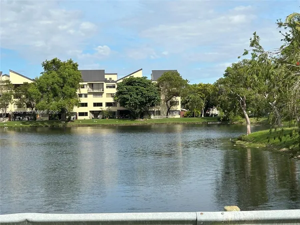 a view of a lake with houses