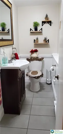 a kitchen with a sink and a stove