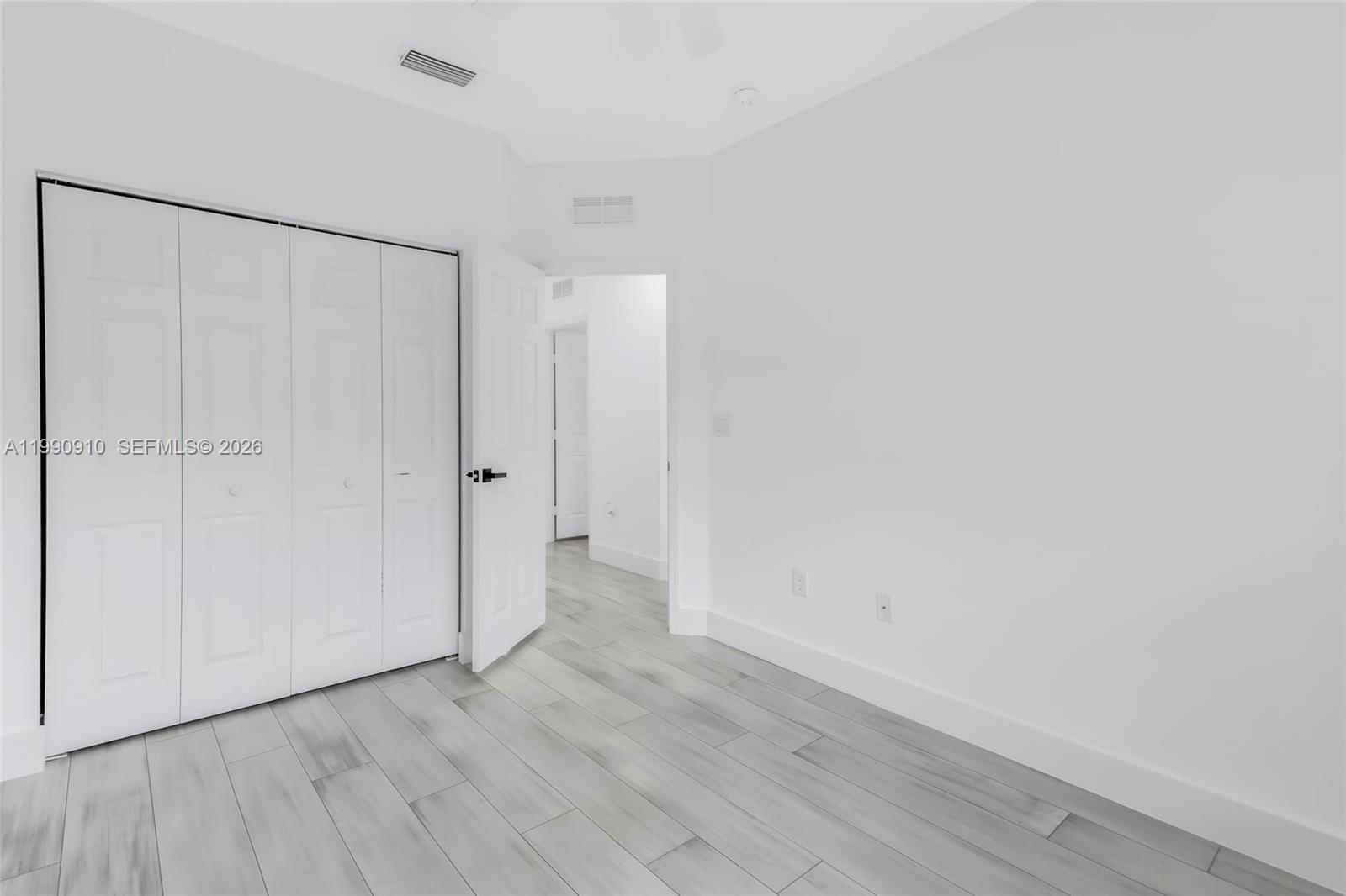 4977 Southwest 135th Way Miramar, FL 33027 - Photo 17 of 28 a view of an empty room