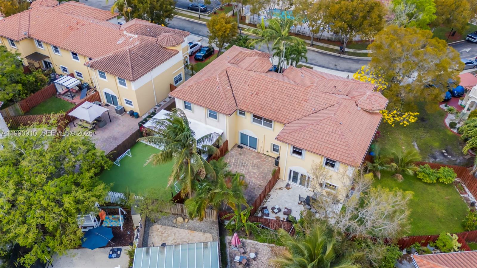 4977 Southwest 135th Way Miramar, FL 33027 - Photo 26 of 28 an aerial view of a house with a garden