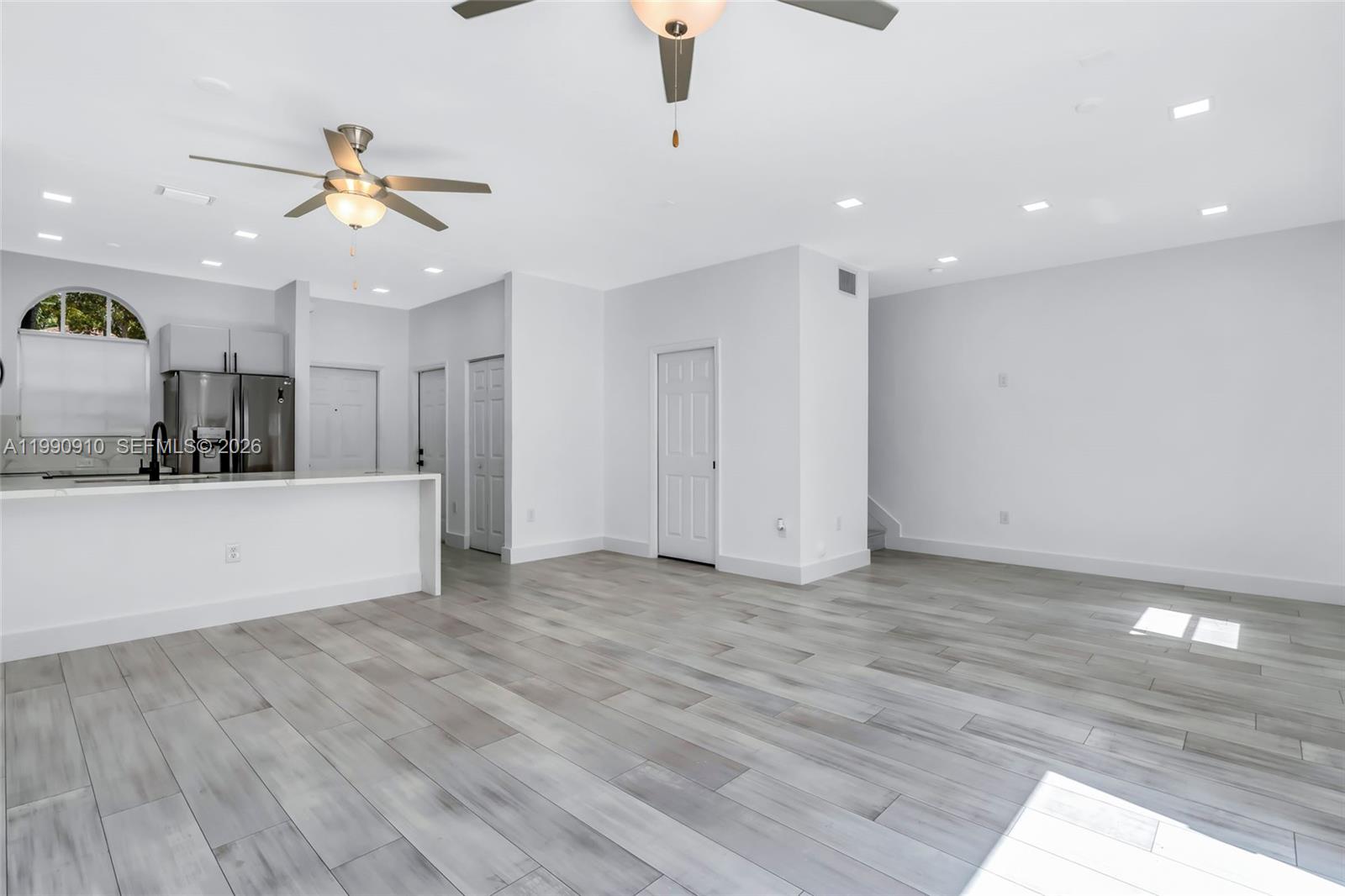 4977 Southwest 135th Way Miramar, FL 33027 - Photo 9 of 28 a view of a kitchen with a sink and a window