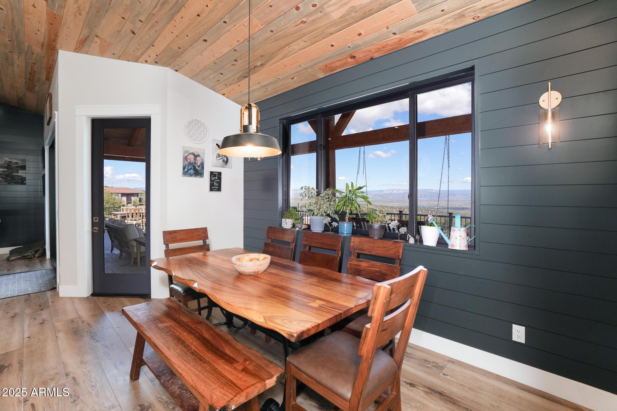 2900 West Spring View Drive Cottonwood, AZ 86326 - Photo 13 of 68 a dining room with furniture and wooden floor