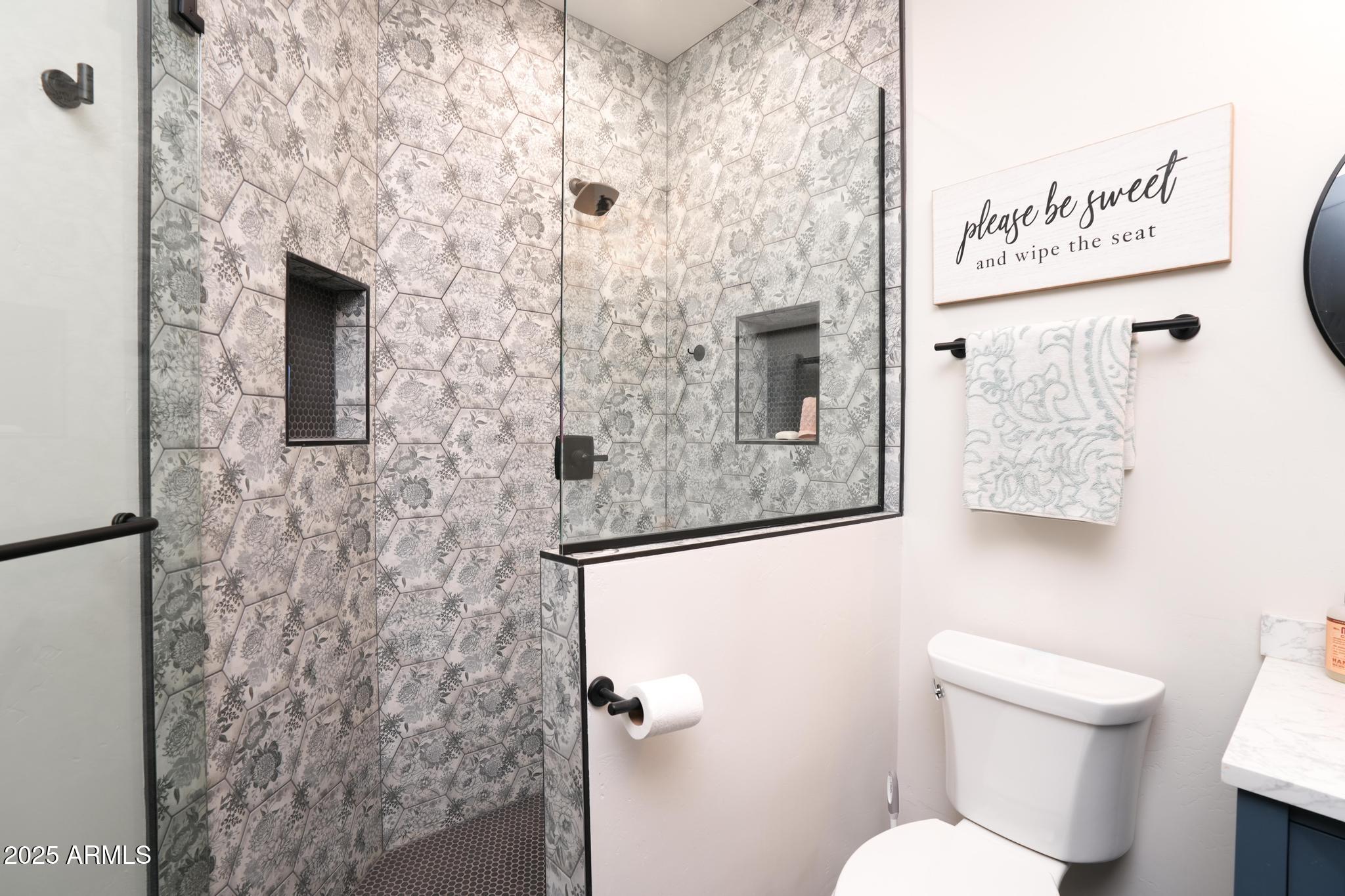 2900 West Spring View Drive Cottonwood, AZ 86326 - Photo 28 of 68 a bathroom with a toilet and a shower curtain