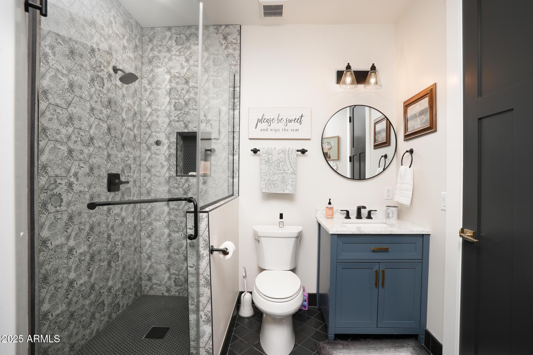 2900 West Spring View Drive Cottonwood, AZ 86326 - Photo 29 of 68 a bathroom with a toilet sink and a shower
