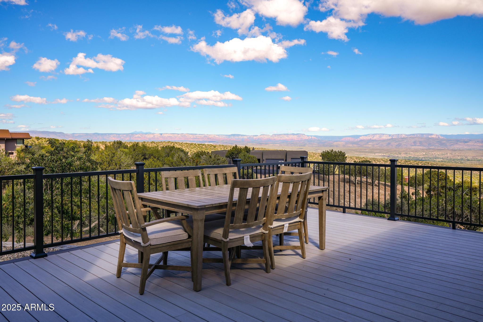 2900 West Spring View Drive Cottonwood, AZ 86326 - Photo 43 of 68 a view of a balcony with furniture and wooden floor