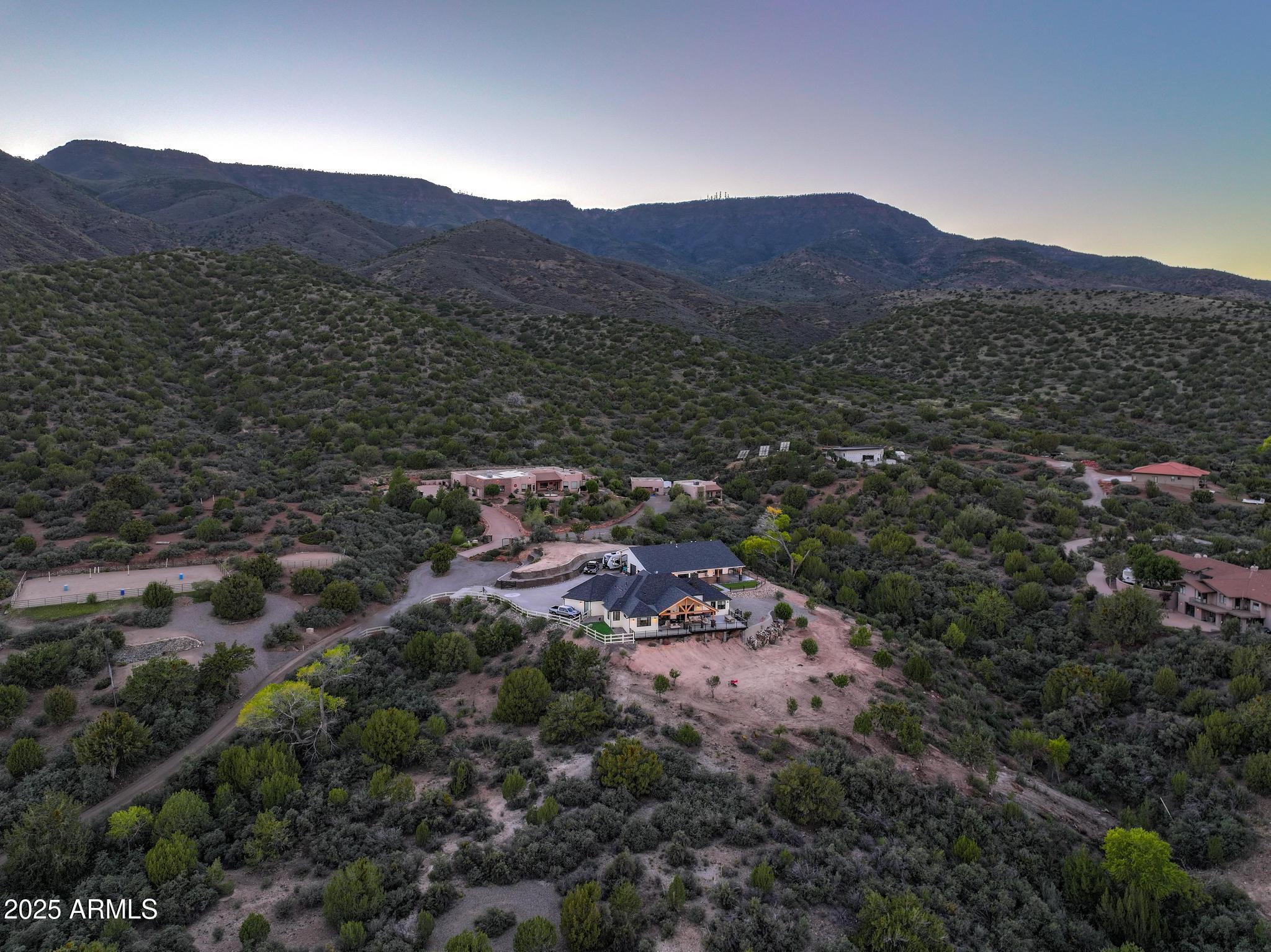 2900 West Spring View Drive Cottonwood, AZ 86326 - Photo 6 of 68 a view of a lush green hillside and a houses