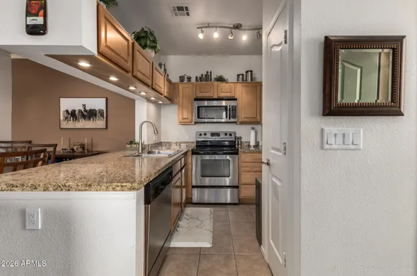 a view of a dining room with furniture