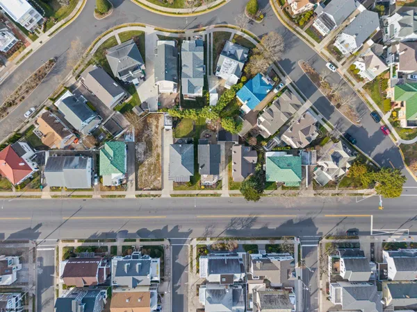 an aerial view of a building with retail shops