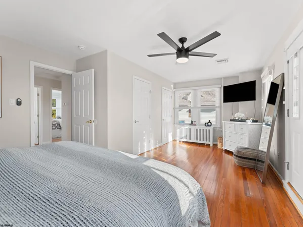 a living room with a couch and a rug