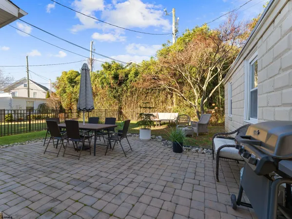 a view of a tables and chairs in patio