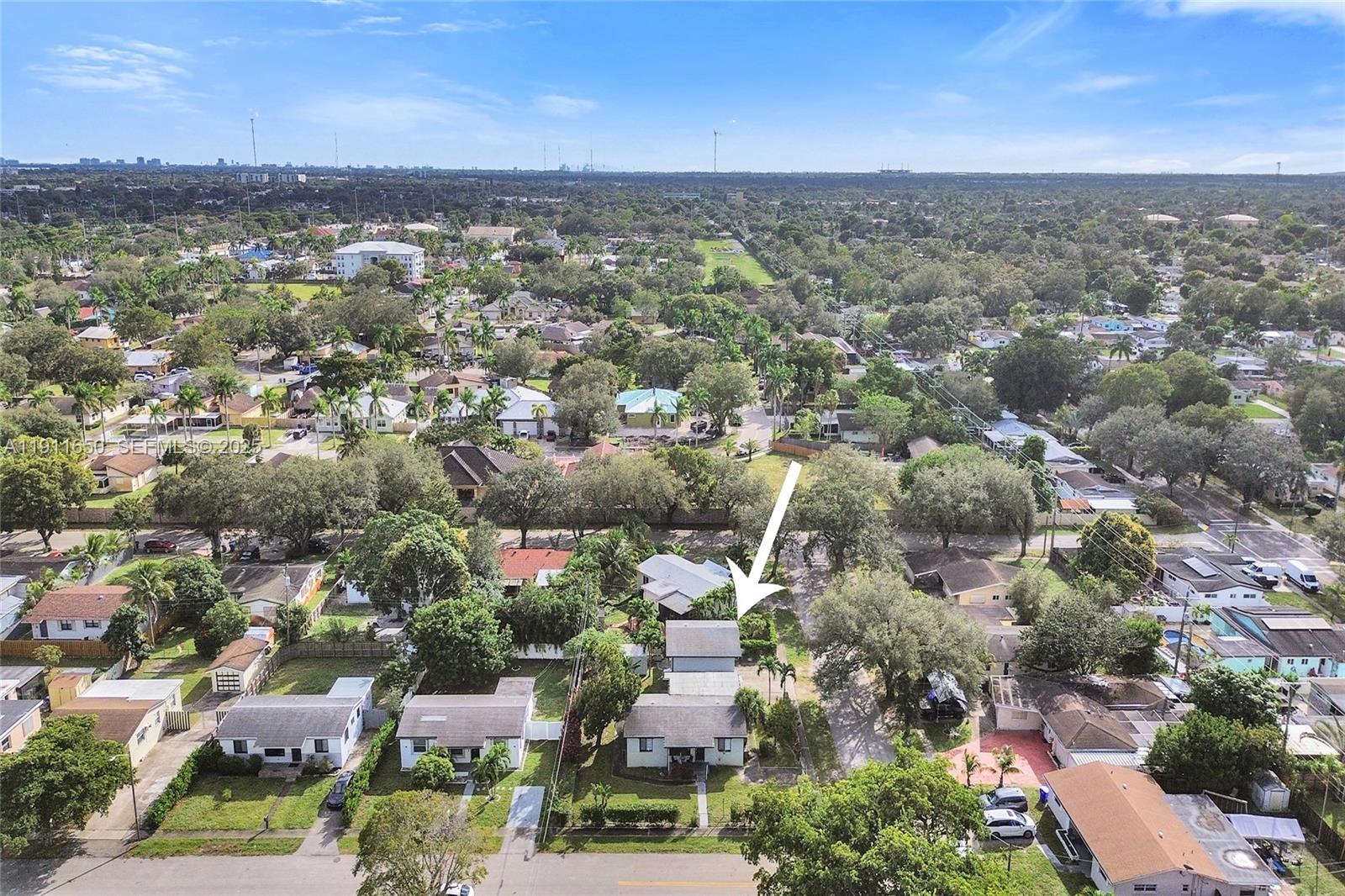 6470 McClellan Street Hollywood, FL 33024 - Photo 13 of 74 an aerial view of a city with lots of residential buildings