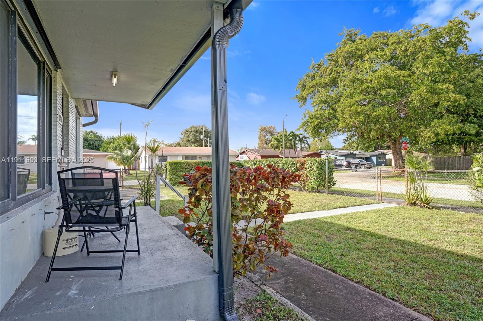 6470 McClellan Street Hollywood, FL 33024 - Photo 23 of 74 a patio with garden area and patio