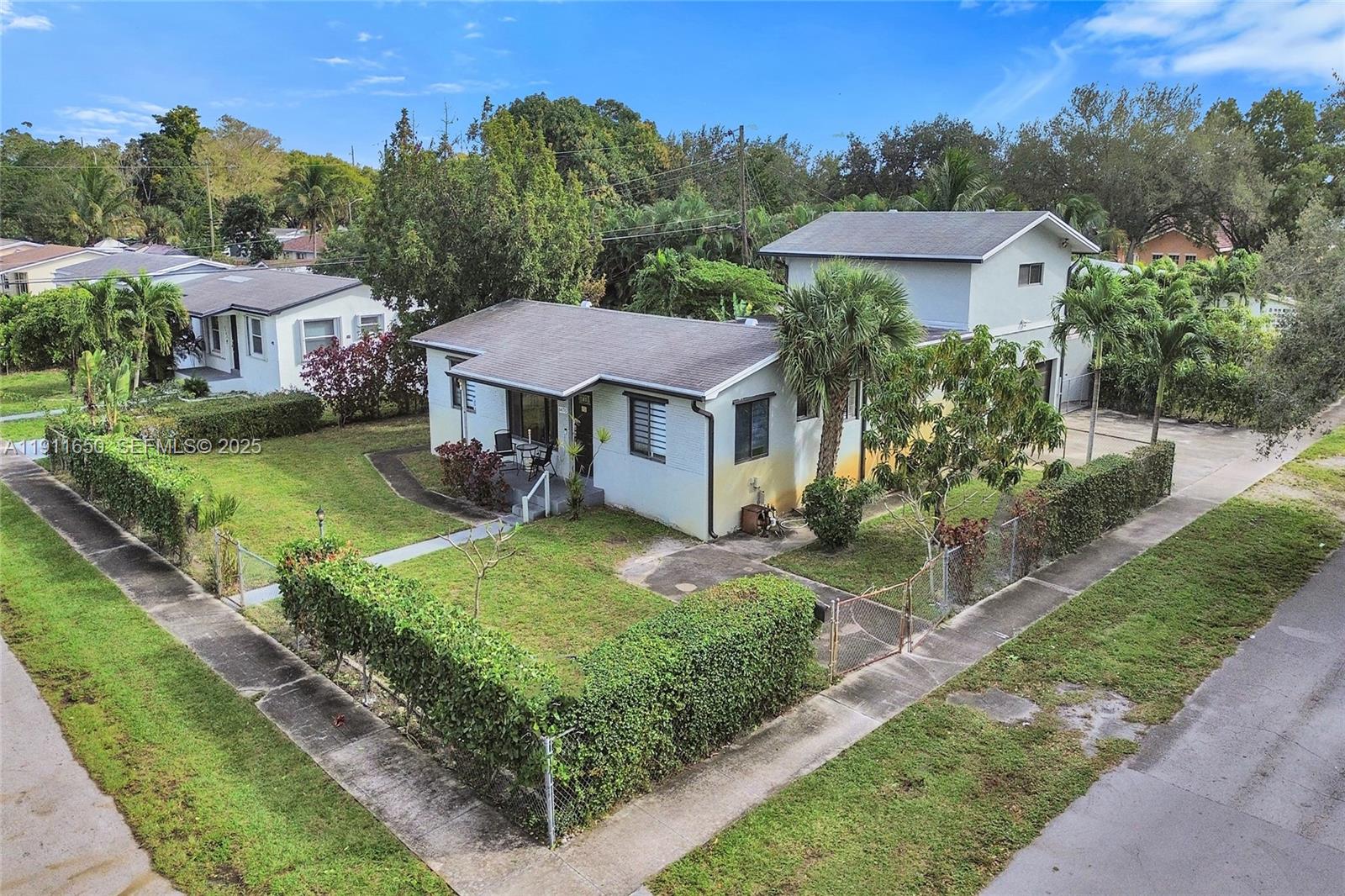 6470 McClellan Street Hollywood, FL 33024 - Photo 4 of 74 an aerial view of a house with garden