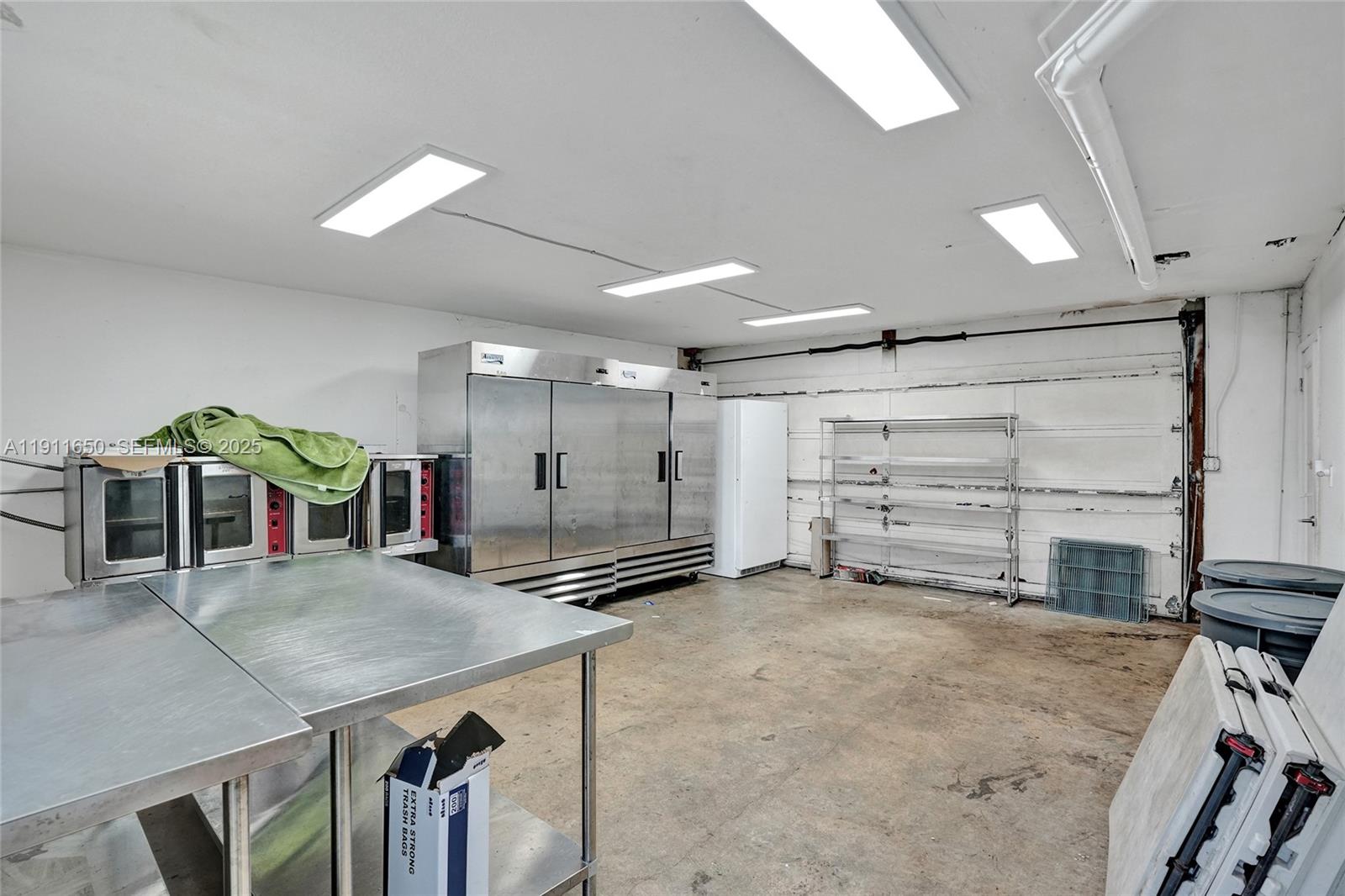 6470 McClellan Street Hollywood, FL 33024 - Photo 42 of 74 a view of a room with gym equipment