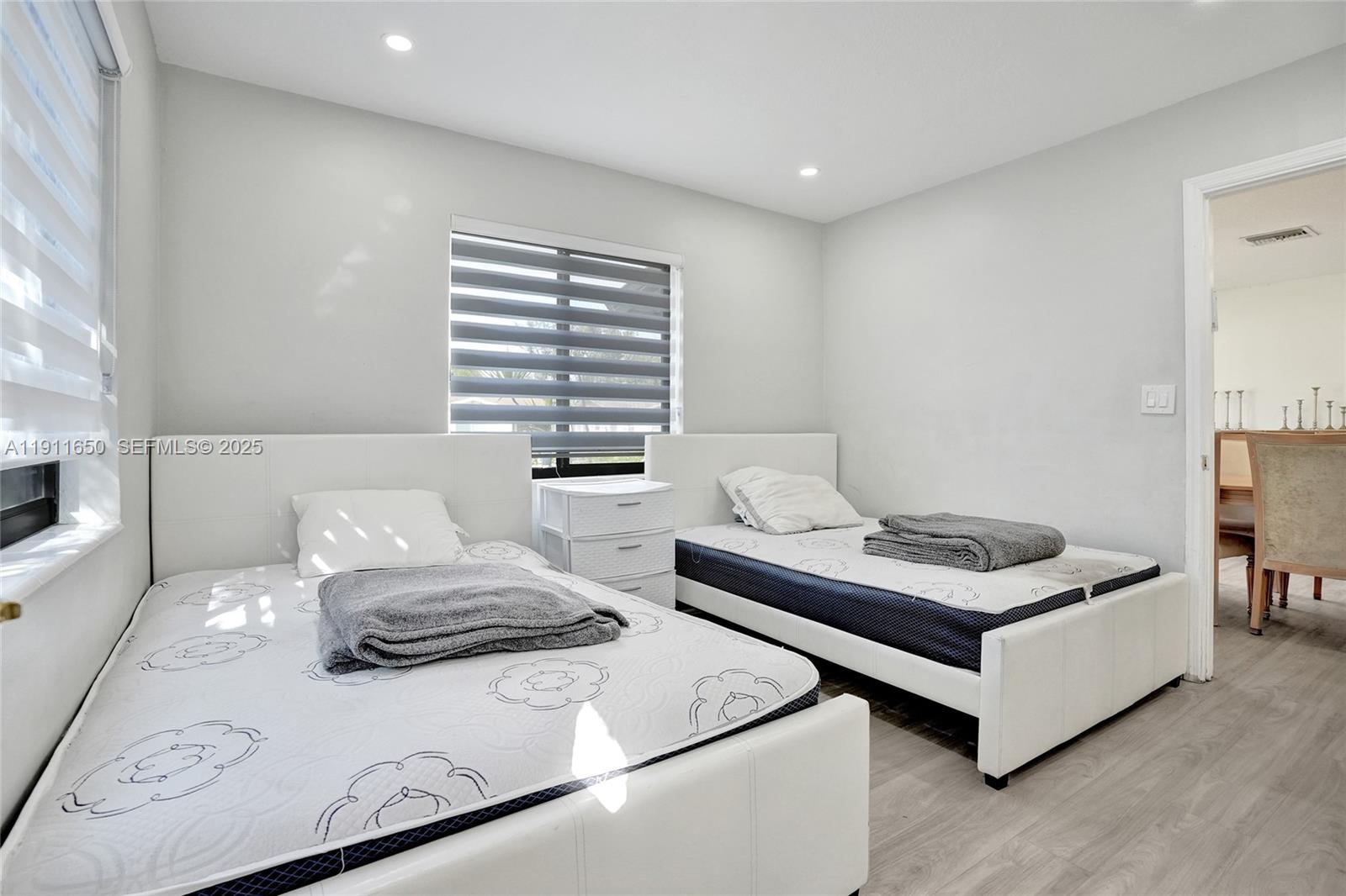 6470 McClellan Street Hollywood, FL 33024 - Photo 59 of 74 a living room with furniture and a couch