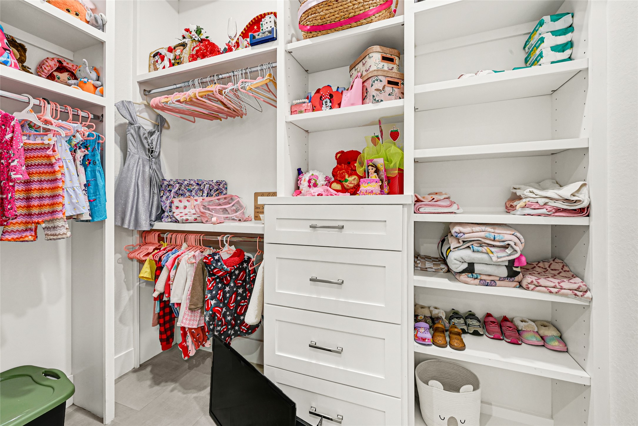 4821 1st Street Houston, TX 77504 - Photo 29 of 48 a utility room with lots of clutter and storage