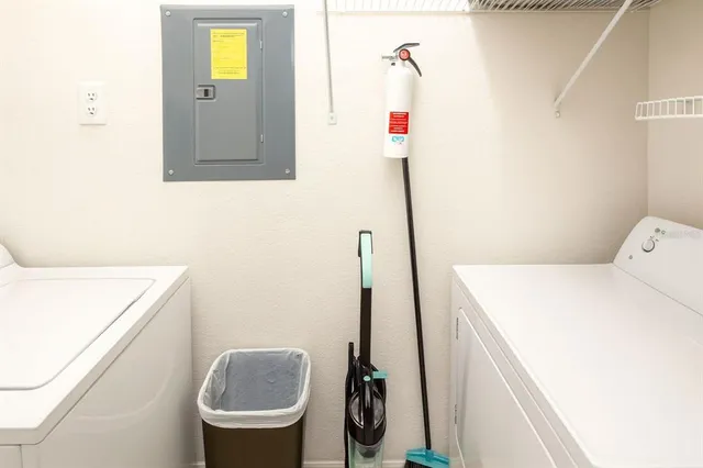 a utility room with dryer and washer