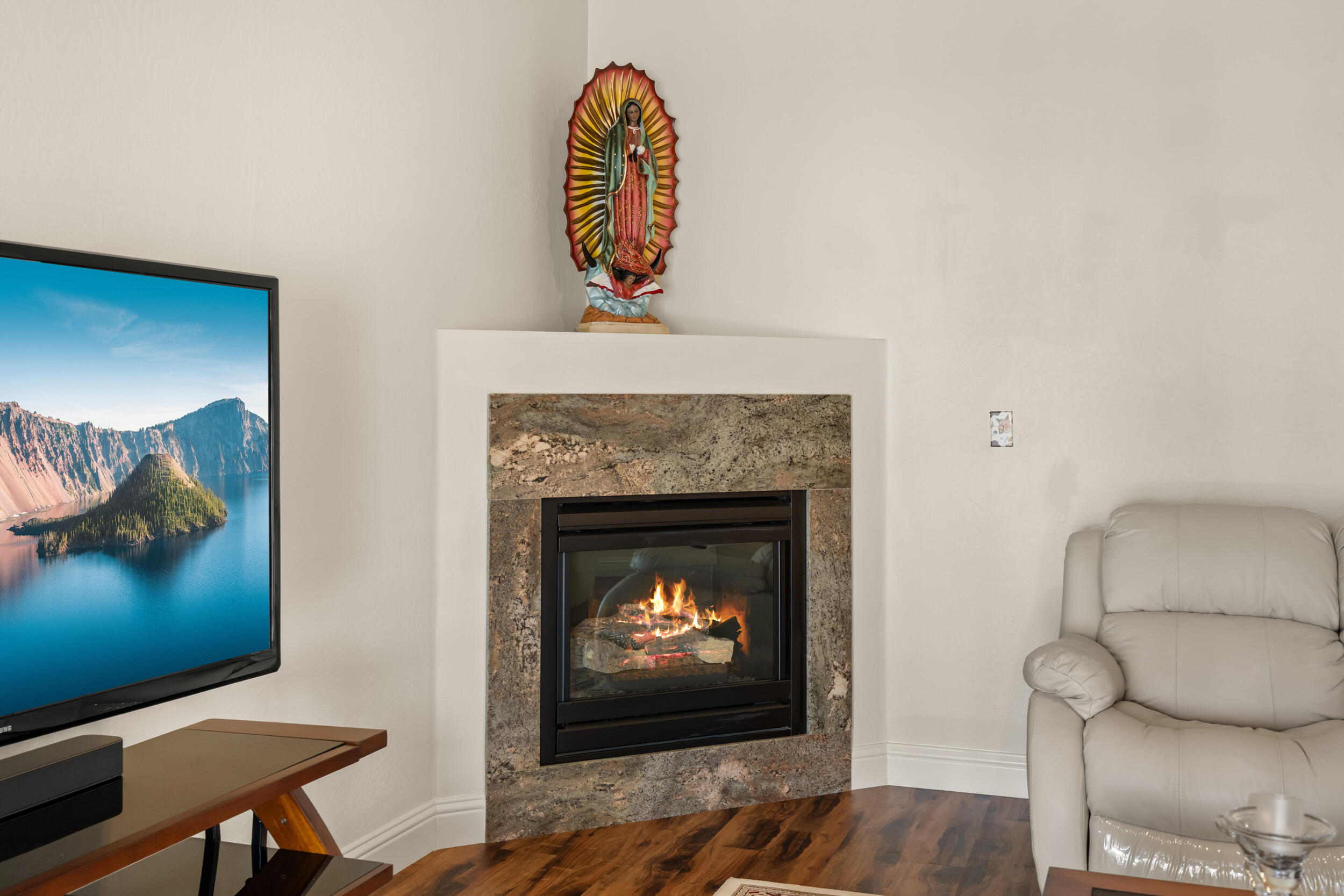 1227 Lithia Way Talent, OR 97540 - Photo 13 of 37 a living room with furniture and a fireplace