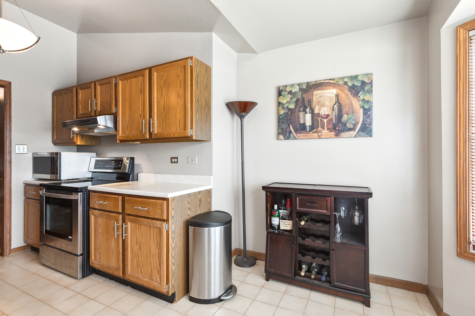 2161 Oak Road, Unit 3A Homewood, IL 60430 - Photo 12 of 20 a kitchen with stainless steel appliances granite countertop a stove and a refrigerator