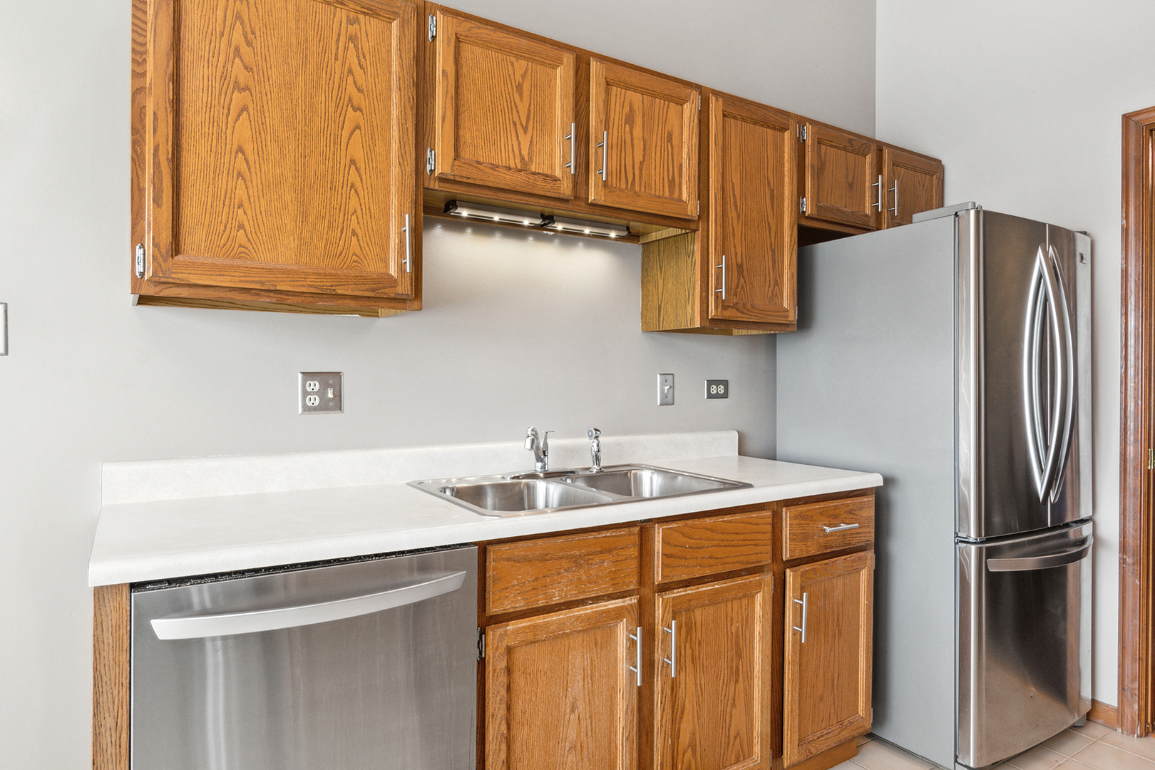 2161 Oak Road, Unit 3A Homewood, IL 60430 - Photo 13 of 20 a kitchen with stainless steel appliances granite countertop a refrigerator sink and stove