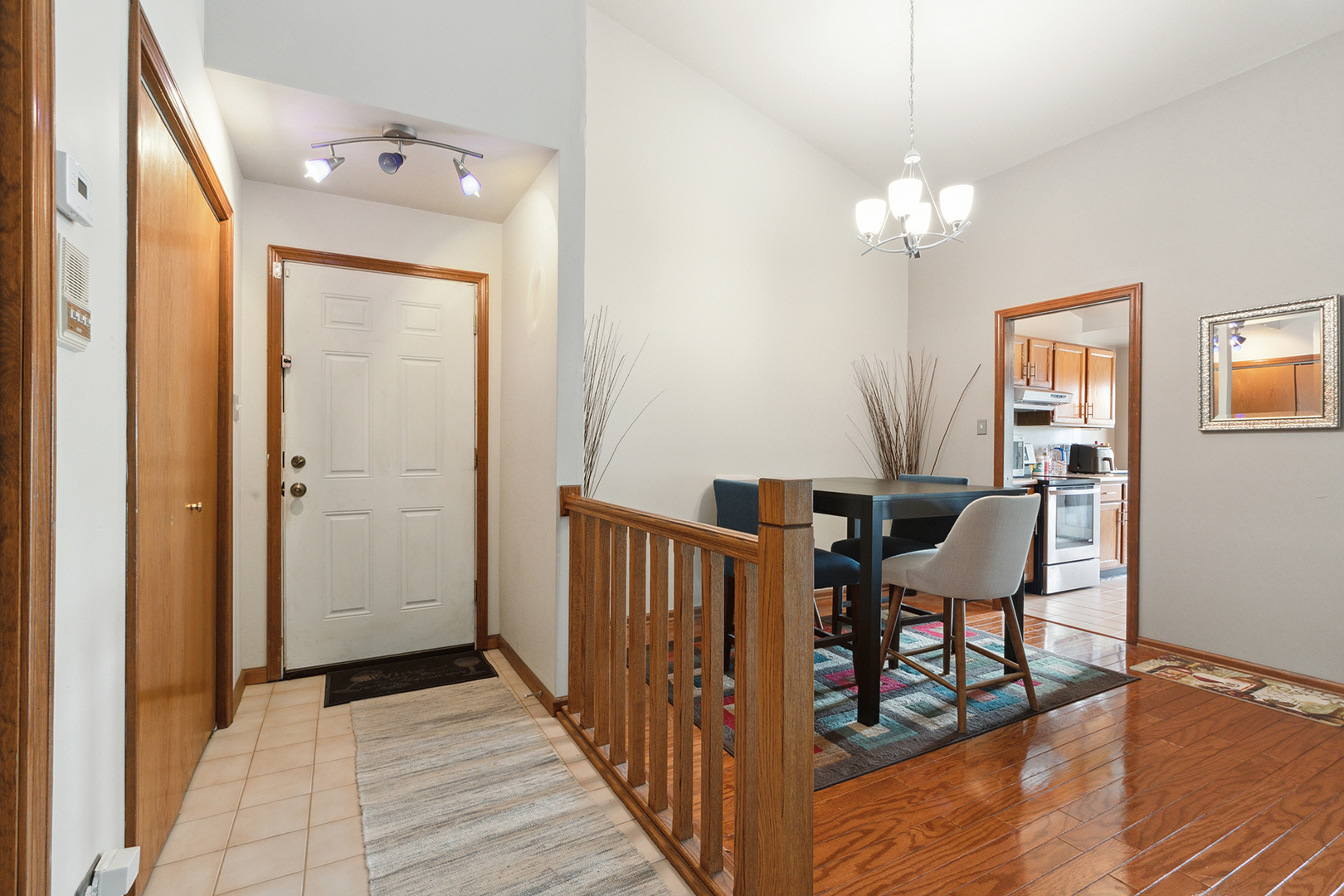 2161 Oak Road, Unit 3A Homewood, IL 60430 - Photo 6 of 20 a view of a dining room with furniture and chandelier