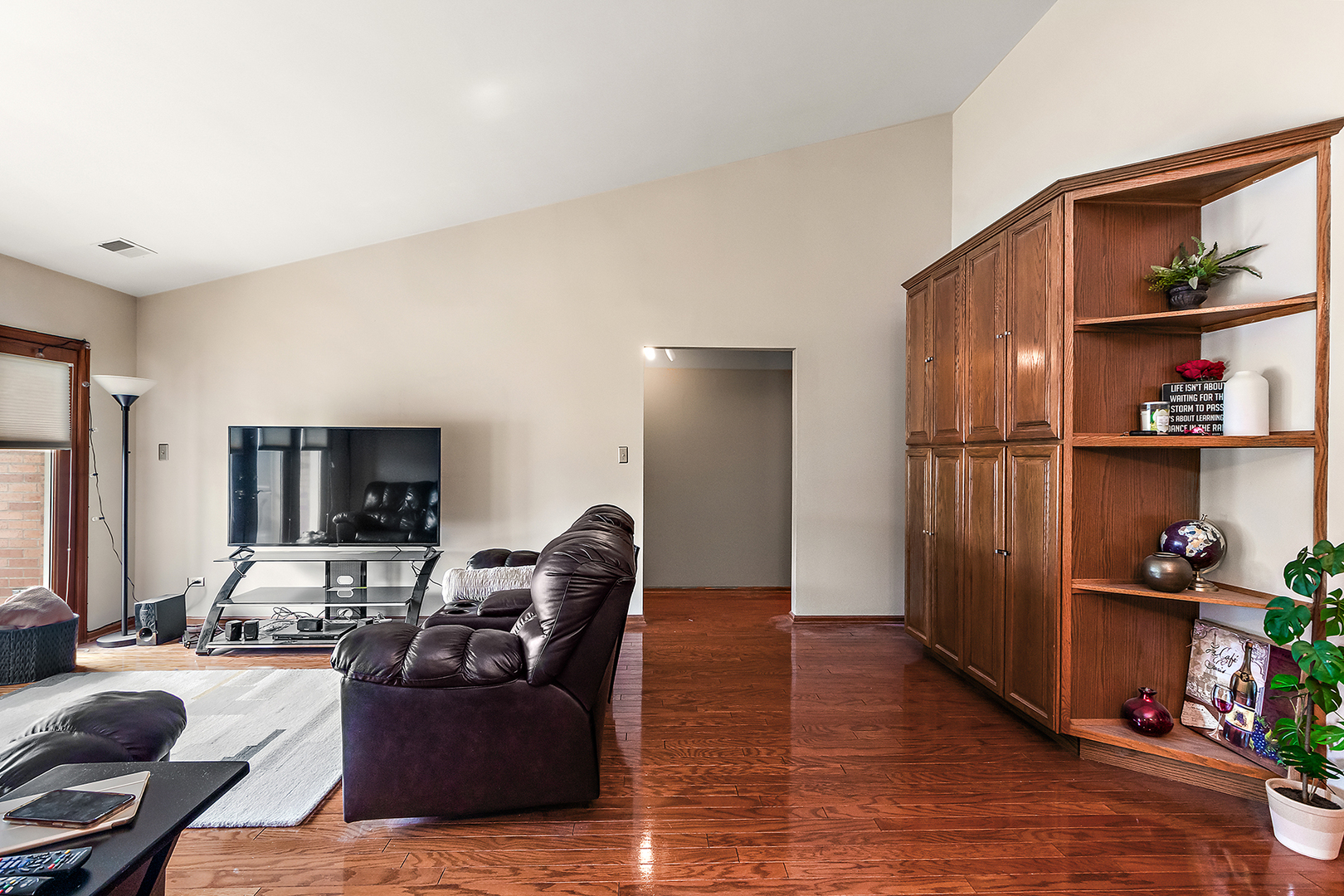 2161 Oak Road, Unit 3A Homewood, IL 60430 - Photo 9 of 20 a living room with furniture and a flat screen tv