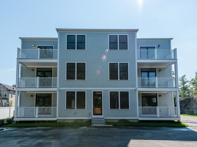 a front view of residential houses