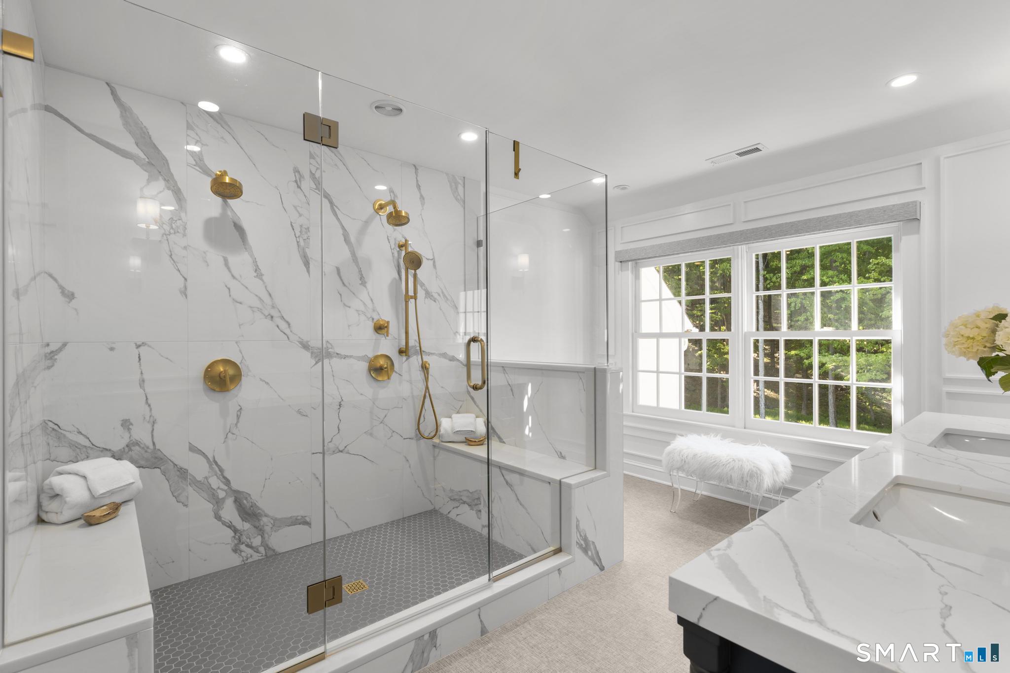 181 Old Branchville Road Ridgefield, CT 06877 - Photo 23 of 40 a bathroom with a tub and a shower