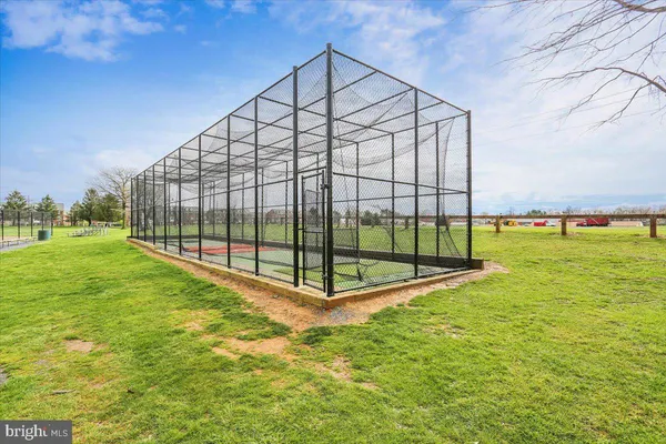a view of an outdoor space and tennis court