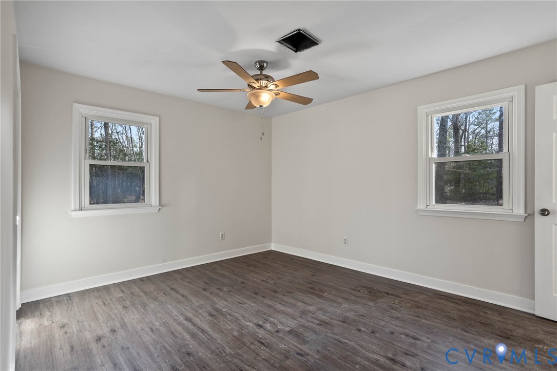 3843 Quinton Road Quinton, VA 23141 - Photo 17 of 26 a view of workspace with wooden floor