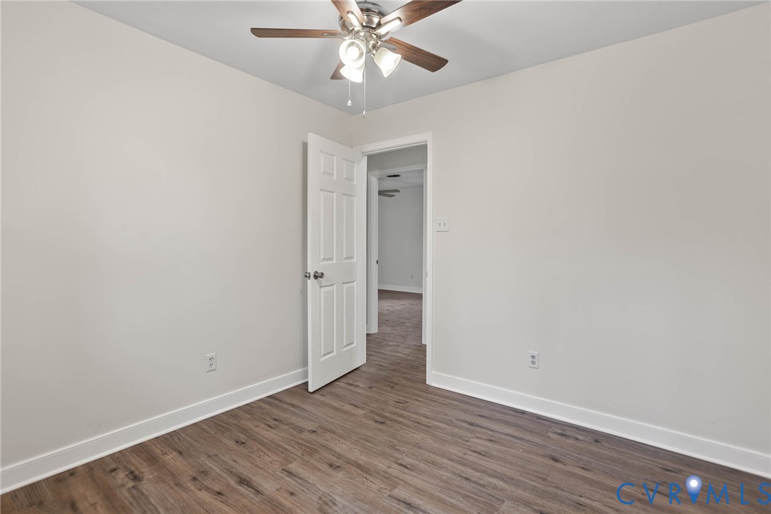 3843 Quinton Road Quinton, VA 23141 - Photo 23 of 26 wooden floor in an empty room