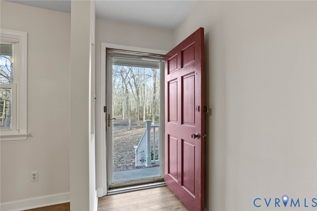 3843 Quinton Road Quinton, VA 23141 - Photo 4 of 26 a view of front door with a mirror