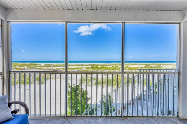 a view of a lake with a beach