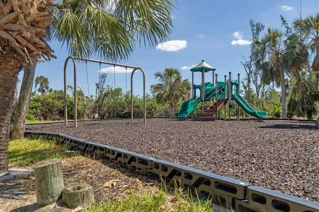 a view of an ocean beach and mountain