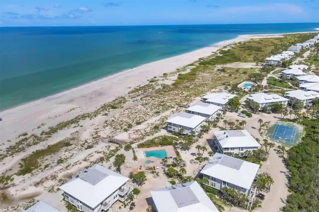 a front view of a building with garden