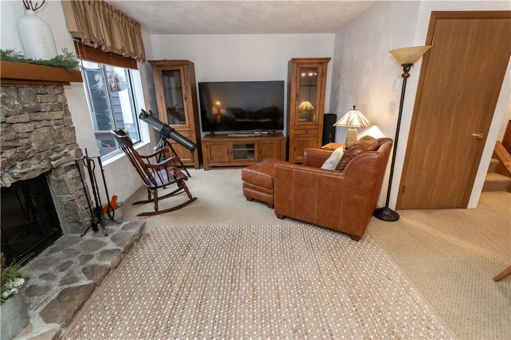 1817 Eagles Ridge Court Hidden Valley, PA 15502 - Photo 11 of 50 a living room with furniture and a flat screen tv